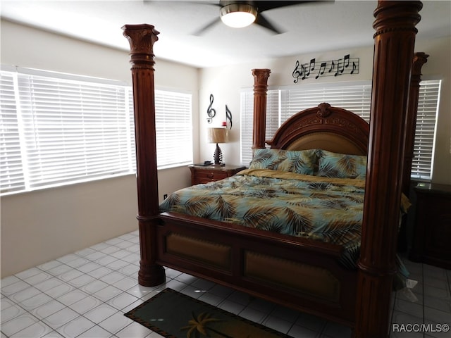 bedroom featuring ceiling fan and light tile patterned floors