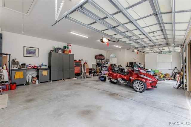 garage featuring a garage door opener