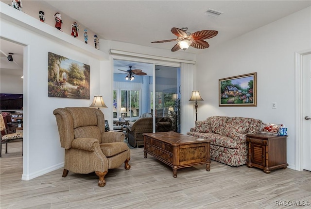 5281 W Cisco St, Beverly Hills, FL 34465 - living area featuring ceiling fan and light wood-style floors