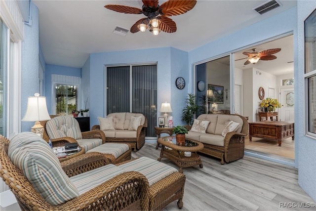 5281 W Cisco St, Beverly Hills, FL 34465 - living area with ceiling fan and light wood-style floors