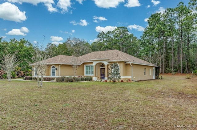 5281 W Cisco St, Beverly Hills, FL 34465 - ranch-style home with stucco siding and a front yard