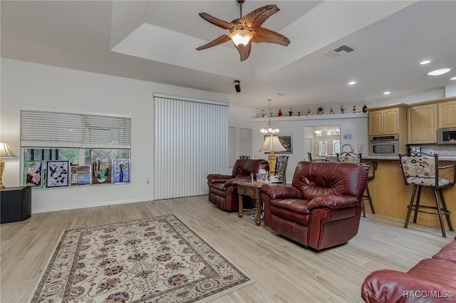 5281 W Cisco St, Beverly Hills, FL 34465 - living area featuring light wood-type flooring, a ceiling fan, and recessed lighting