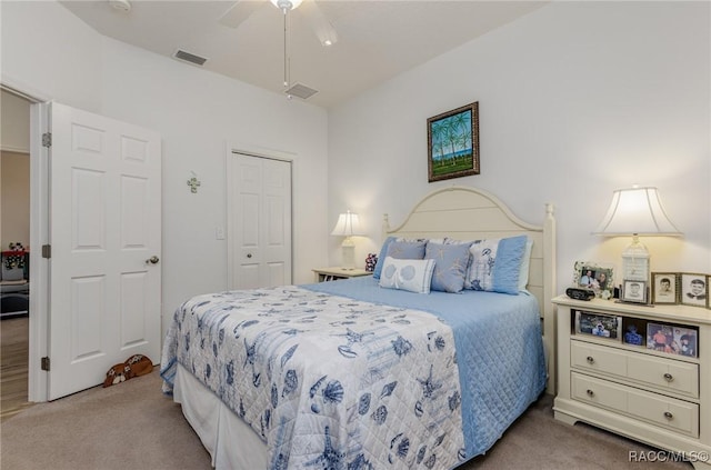 bedroom with carpet flooring, ceiling fan, and a closet