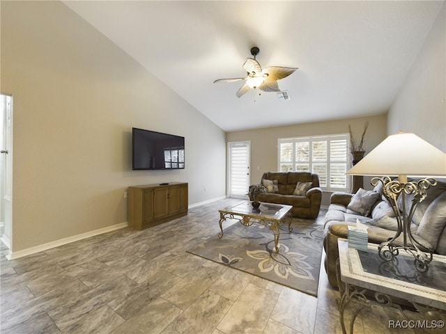 living room featuring vaulted ceiling and ceiling fan