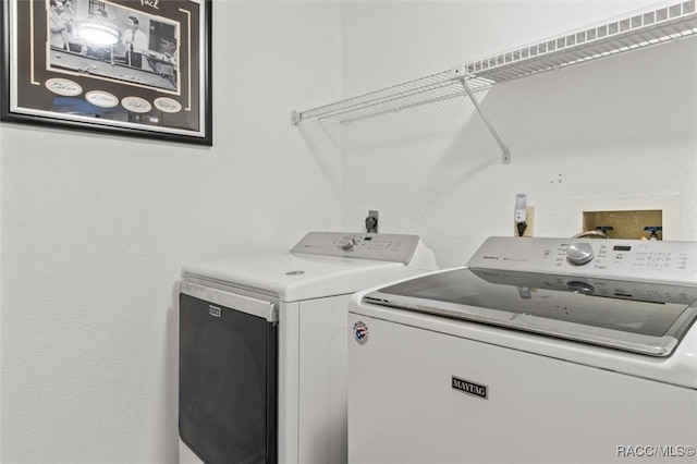834 E Boston St, Hernando, FL 34442 - clothes washing area with independent washer and dryer
