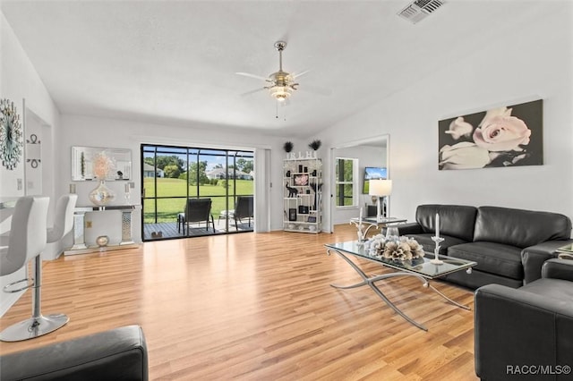 834 E Boston St, Hernando, FL 34442 - living area featuring ceiling fan, wood finished floors, and lofted ceiling