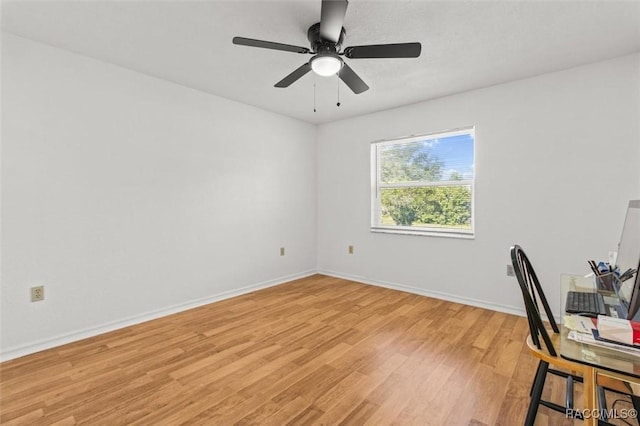 834 E Boston St, Hernando, FL 34442 - office space featuring light wood-type flooring, a ceiling fan, and baseboards