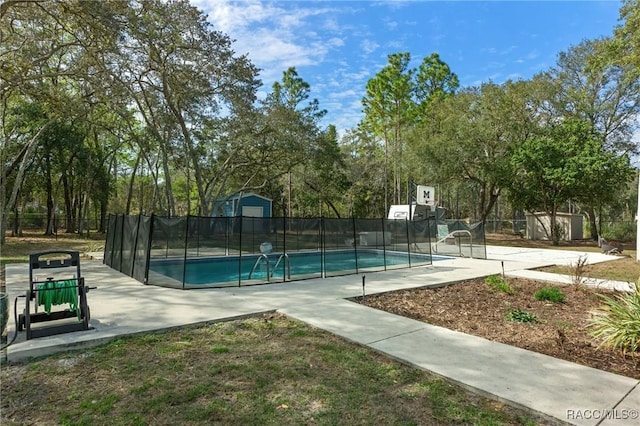 view of basketball court featuring a fenced in pool