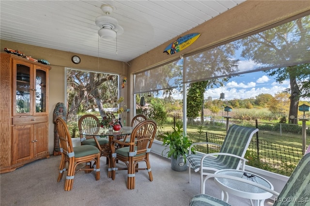 sunroom / solarium with ceiling fan