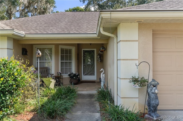 entrance to property with a garage