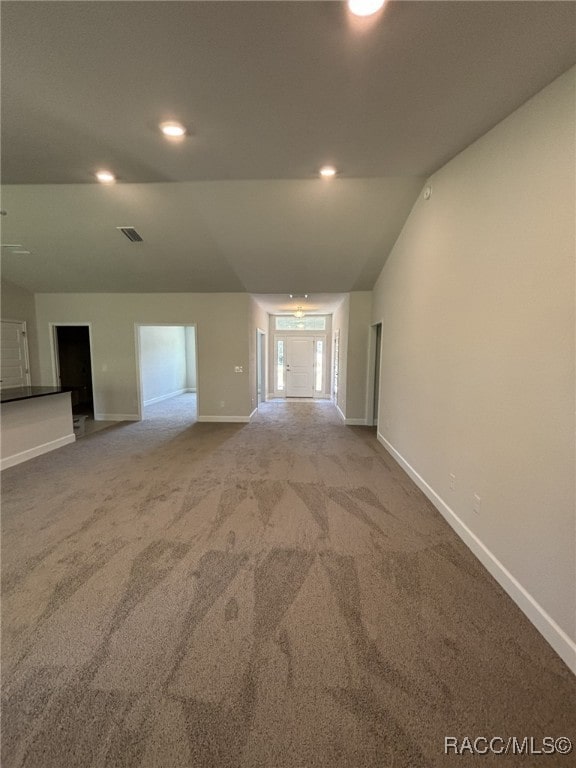 2400 W Tall Oaks Dr, Beverly Hills, FL 34465 - empty room with baseboards, carpet floors, recessed lighting, and lofted ceiling
