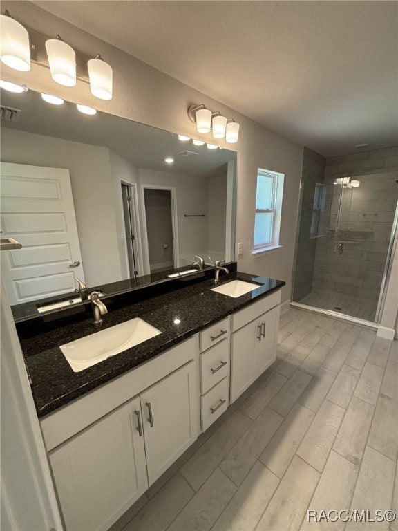 2400 W Tall Oaks Dr, Beverly Hills, FL 34465 - full bath featuring a shower stall and double vanity