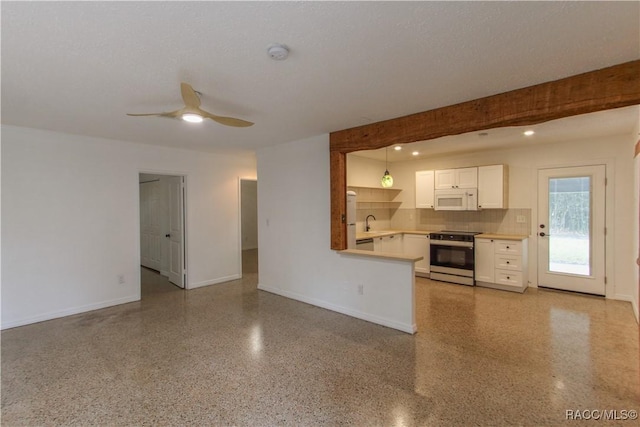 interior space with stainless steel electric stove, white cabinets, ceiling fan, decorative backsplash, and hanging light fixtures