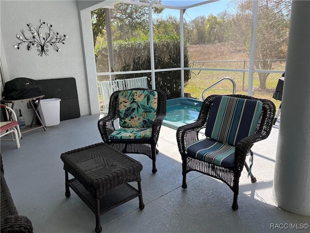 sunroom / solarium featuring a wealth of natural light