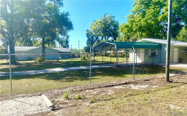 view of yard with a carport