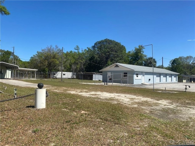 view of yard with a carport