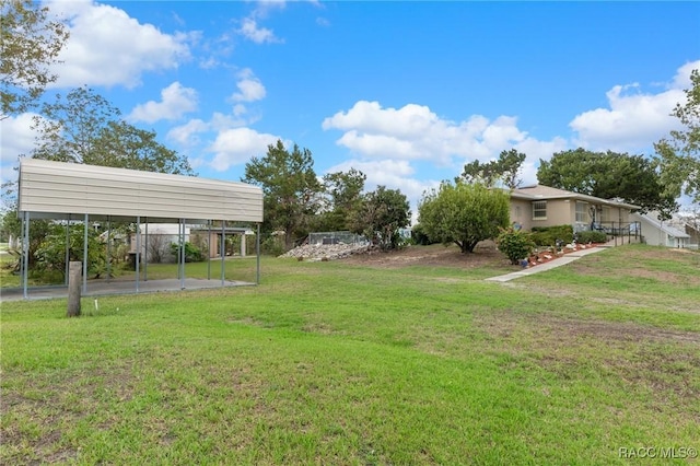 view of yard with a carport