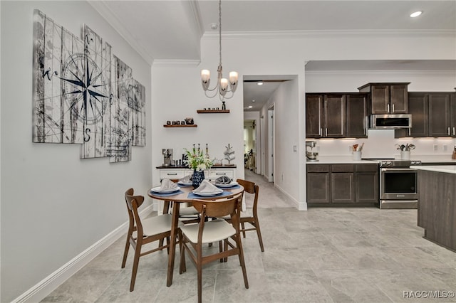 dining room featuring an inviting chandelier and crown molding