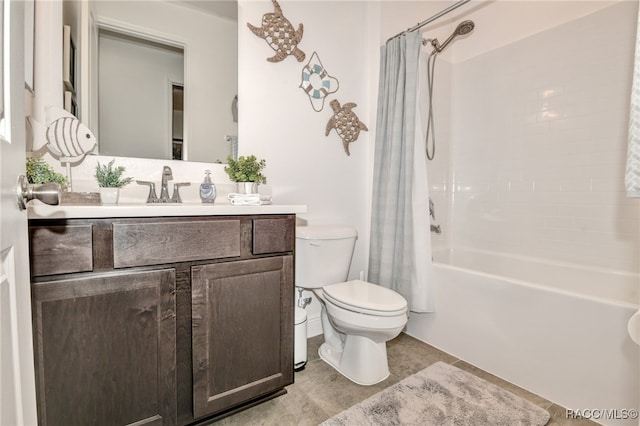 full bathroom with vanity, toilet, and shower / bath combo with shower curtain