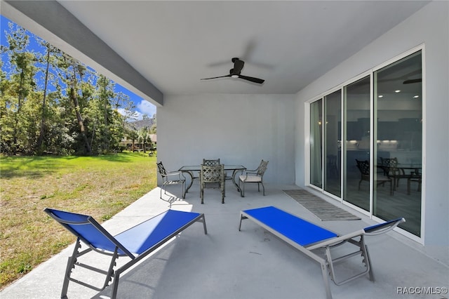 view of patio with ceiling fan