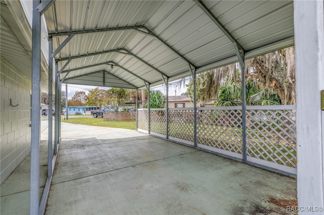 view of patio featuring a carport