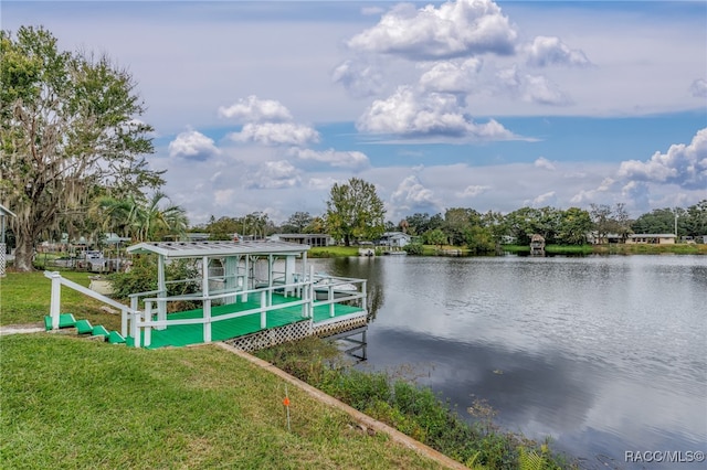 dock area featuring a water view