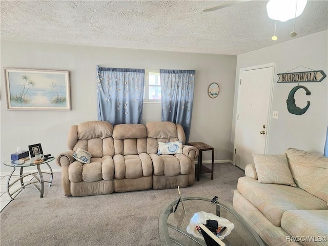 carpeted living room with a textured ceiling