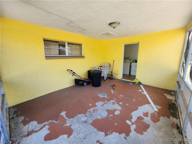 view of patio / terrace featuring washer and clothes dryer