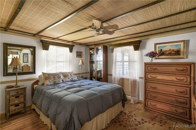 13465 W Hillbilly Ln, Crystal River, FL 34429 - bedroom featuring wood finished floors, baseboards, and ceiling fan