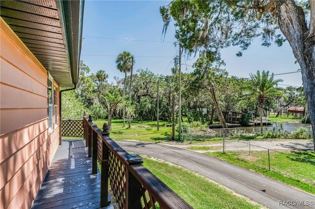 13465 W Hillbilly Ln, Crystal River, FL 34429 - balcony featuring a water view and view of scattered trees