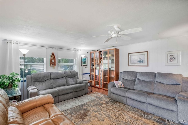 13465 W Hillbilly Ln, Crystal River, FL 34429 - living area featuring a ceiling fan and wood finished floors
