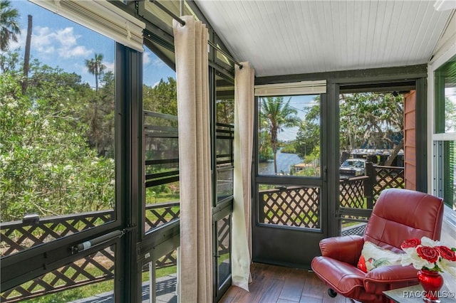 13465 W Hillbilly Ln, Crystal River, FL 34429 - sunroom / solarium featuring a water view