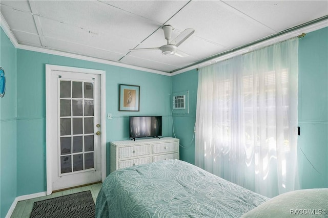 13465 W Hillbilly Ln, Crystal River, FL 34429 - bedroom with crown molding, ceiling fan, and baseboards
