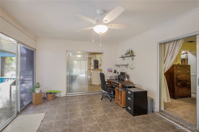 office area featuring ceiling fan and light colored carpet