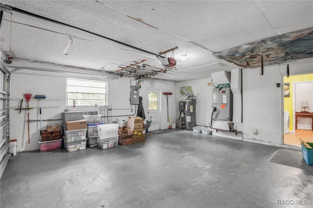 garage featuring heating unit, electric panel, a garage door opener, and water heater