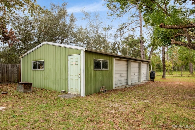 view of outbuilding featuring a garage