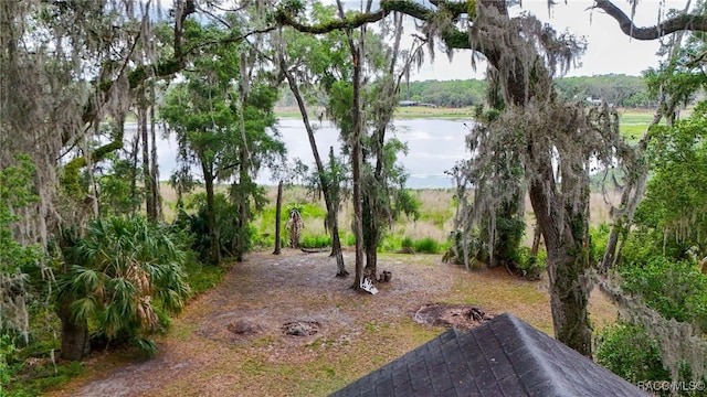 view of yard with a water view