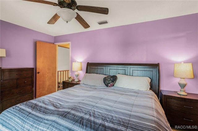 bedroom featuring ceiling fan and visible vents