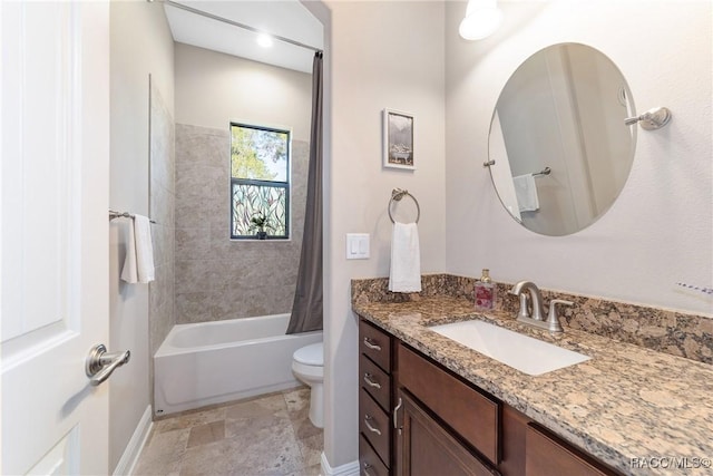 full bathroom featuring shower / tub combo, vanity, and toilet