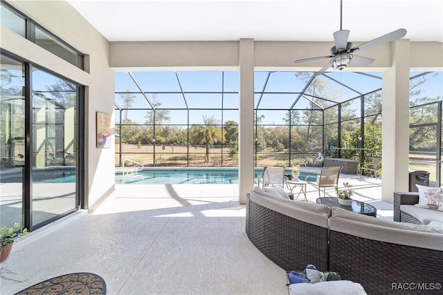 view of patio with outdoor lounge area and a lanai