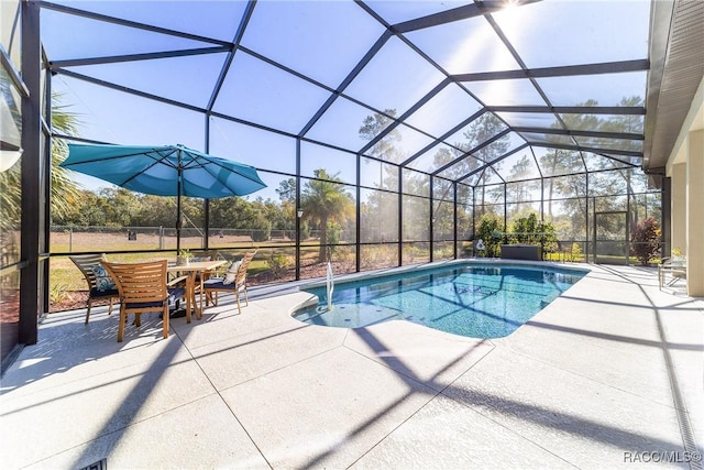 view of pool featuring a lanai and a patio area