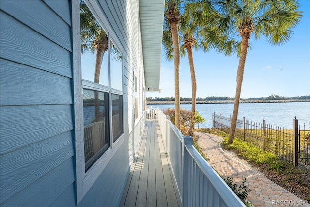 balcony featuring a water view