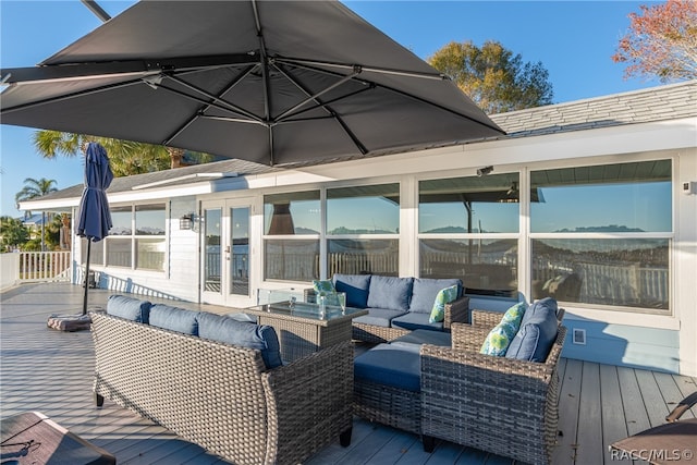 deck featuring french doors and an outdoor hangout area