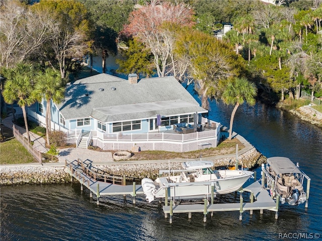 drone / aerial view featuring a water view