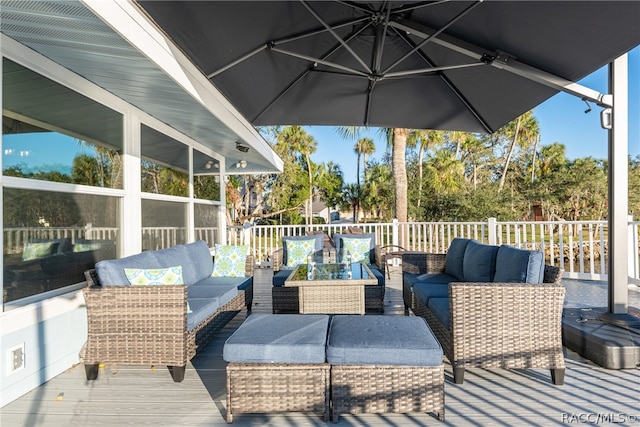 wooden deck featuring an outdoor living space