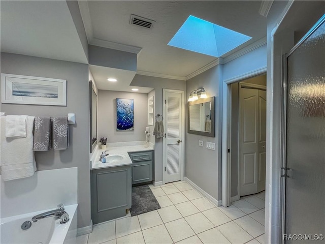 bathroom with a closet, vanity, visible vents, and crown molding