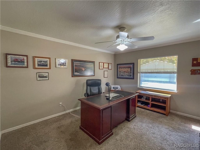 office area with crown molding, light colored carpet, a ceiling fan, a textured ceiling, and baseboards