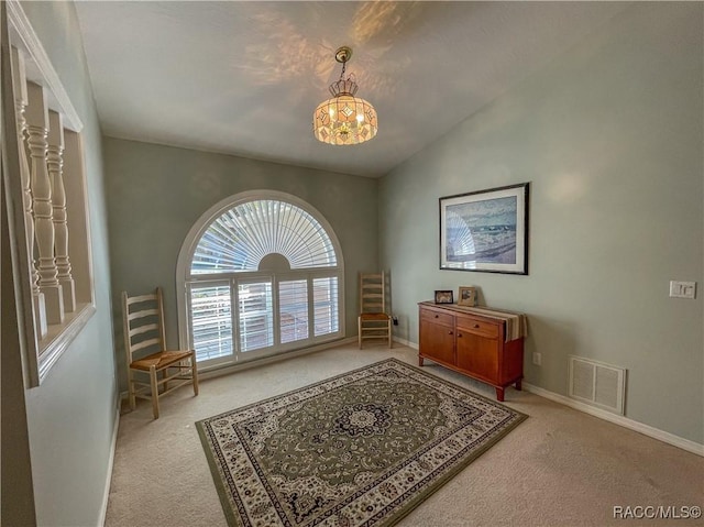 living area with vaulted ceiling, carpet, visible vents, and baseboards