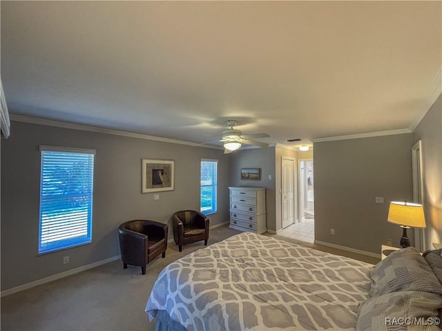 bedroom with baseboards, ornamental molding, ceiling fan, and light colored carpet