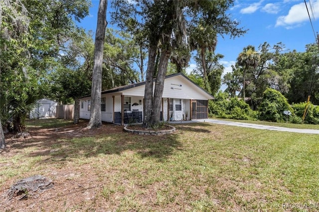 4080 N Eagle Nest Pt, Crystal River, FL 34428 - single story home with a front yard and a shed